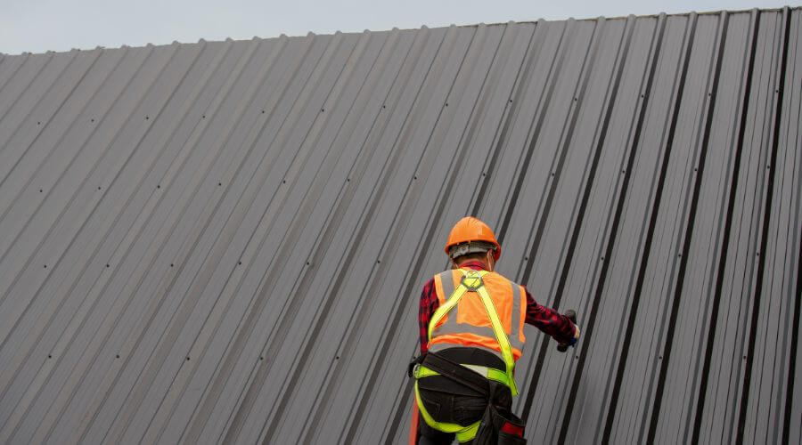 Professional metal roof installation services in Hulbert, MI